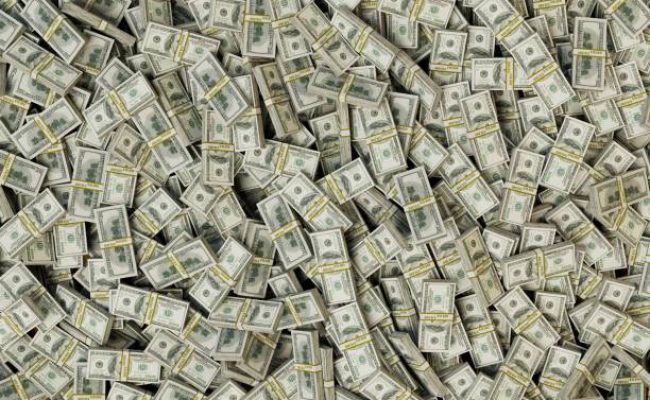 abstract background consisting of packs of paper dollars. 3d render.